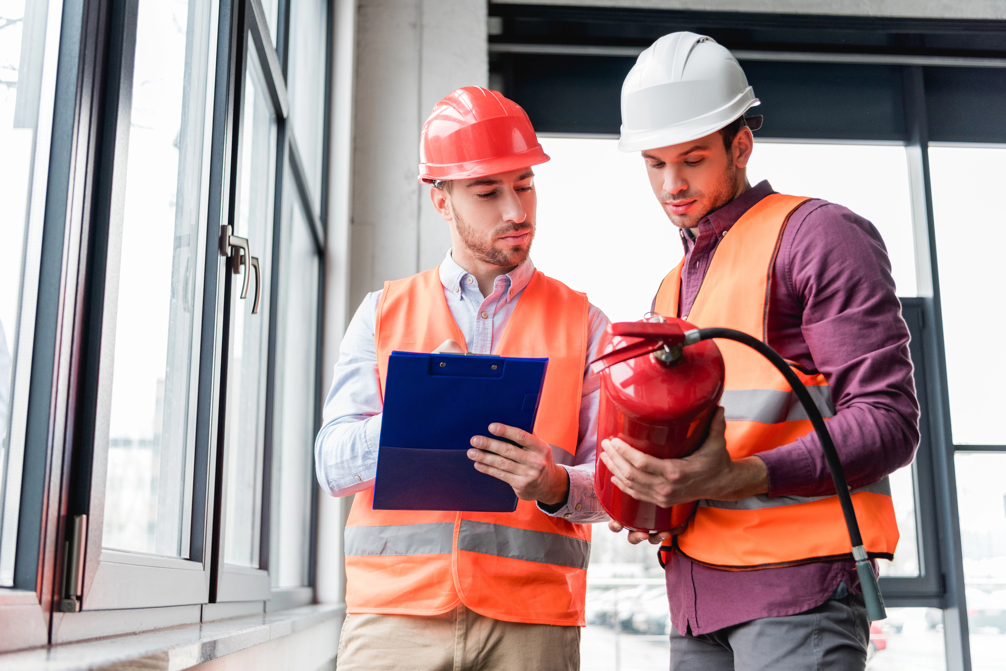 Commercial fire protection system provider Rhodes Security Systems inspects extinguisher and safety equipment